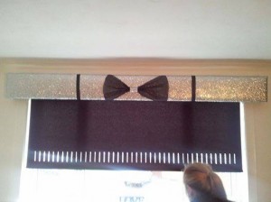 silver glitter with large black bow and ribbon
